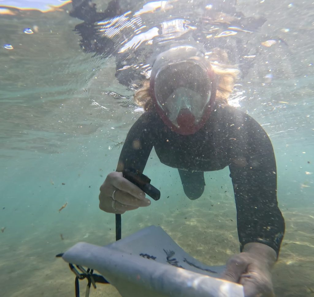 underwater artist drawing art under water ocean